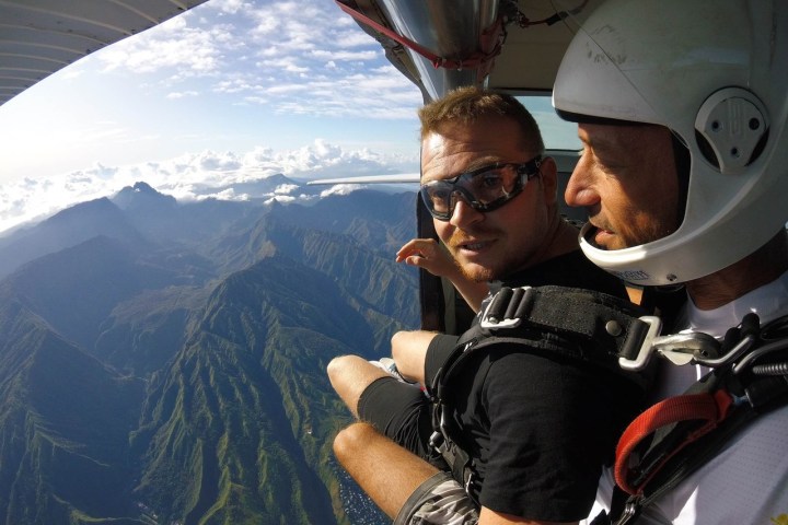 a man standing on top of a mountain